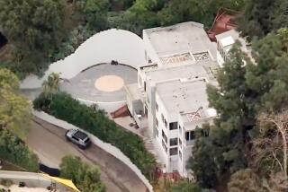 Squatters set up at a Hollywood Hills home.