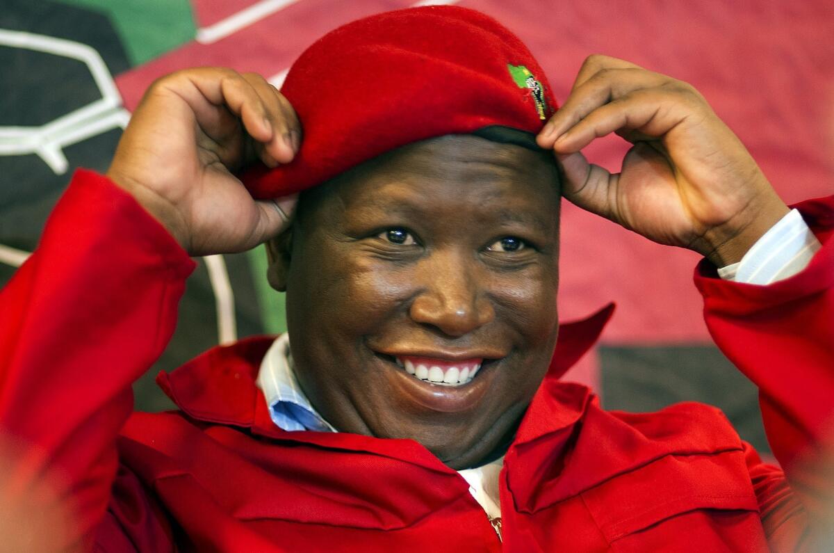 The South African opposition politician Julius Malema, shown at a Feb. 13 news conference, is among several figures being investigated by the government for alleged ties to the CIA.