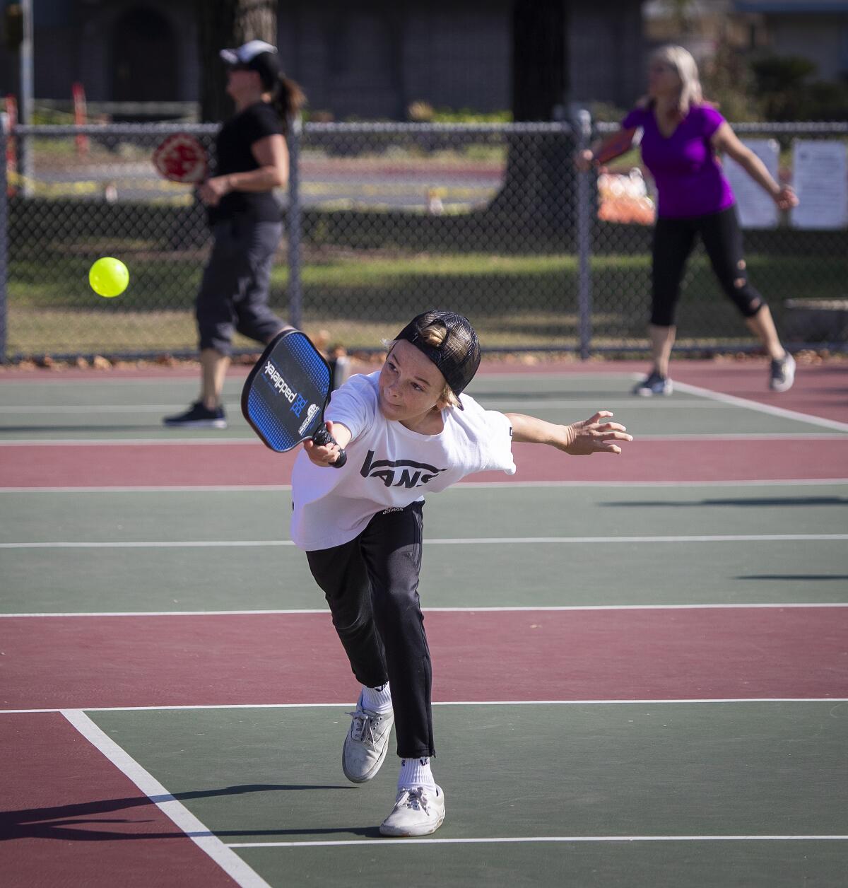 Kids such as Jett Joyner, 13, of Huntington Beach, are picking up pickleball too.