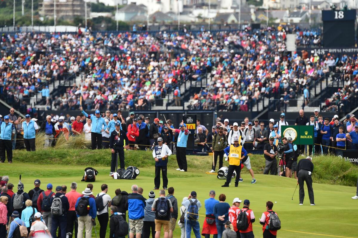 Spectators watch the action during the second round of the British Open.