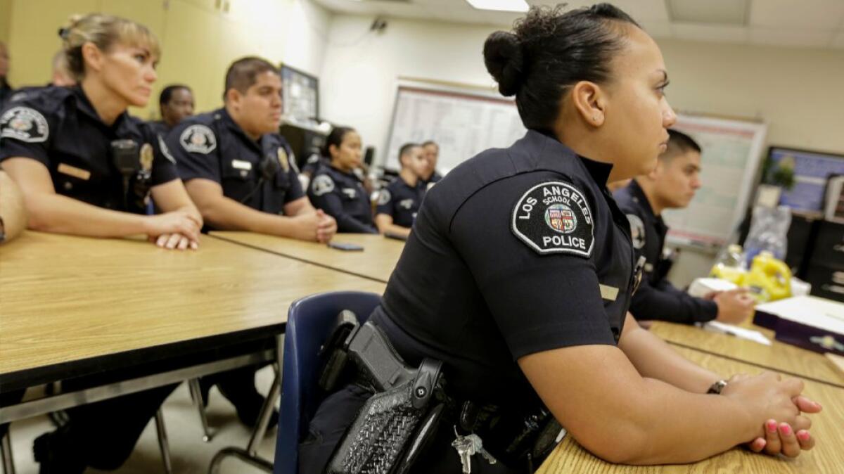 Officers from the Los Angeles School Police Department at a morning roll call at King Drew Magnet High School of Medicine and Science in 2015.