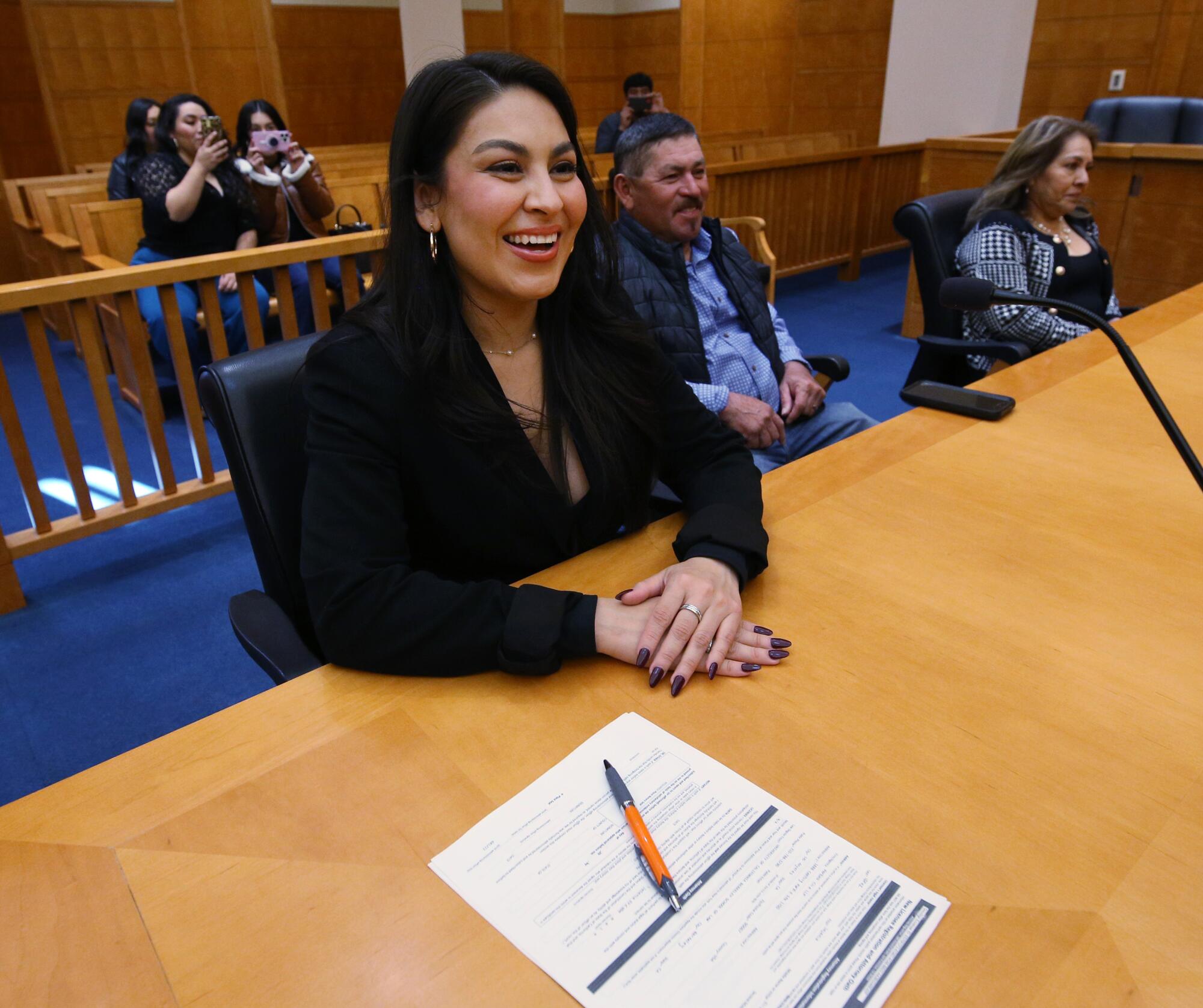Jessenia Nunez hears instructions at the Robert E. Coyle Federal Courthouse by Ana De Alba, who serves as United S