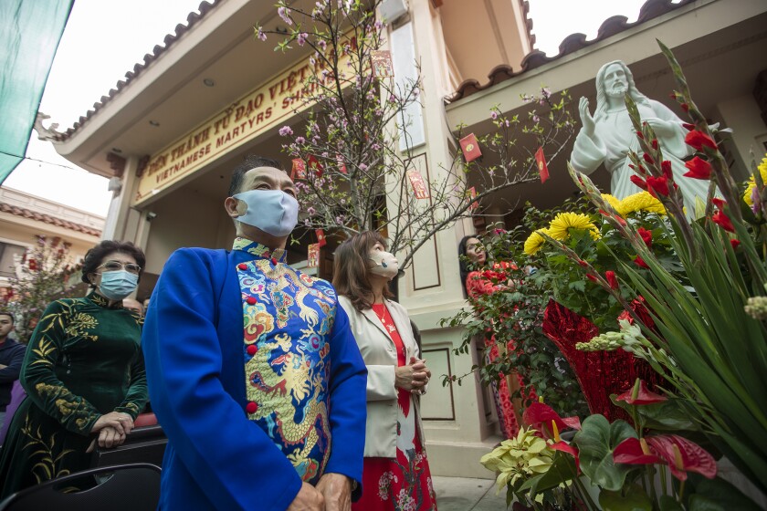 Parishioners attend a mass at the Vietnamese Catholic Center in Santa Ana.