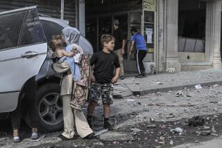 NABATIEH, LEBANON - OCTOBER 18: People get ready to leave the city after Israeli attacks in Al-Fawka town of Nabatieh, Lebanon on October 18, 2024. (Photo by Murat Sengul/Anadolu via Getty Images)