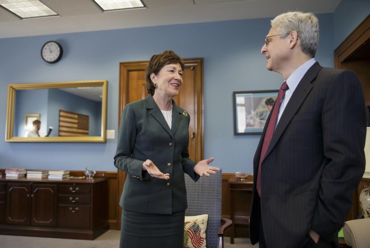 Sen. Susan Collins (R-Maine) meets with Merrick Garland, President Obama's nominee for the Supreme Court, at her office in Washington on Tuesday.