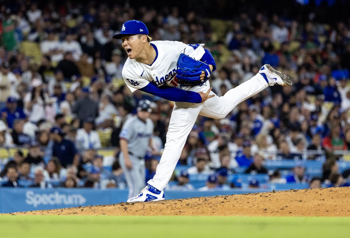 Yoshinobu Yamamoto pitches in the fourth inning Tuesday.