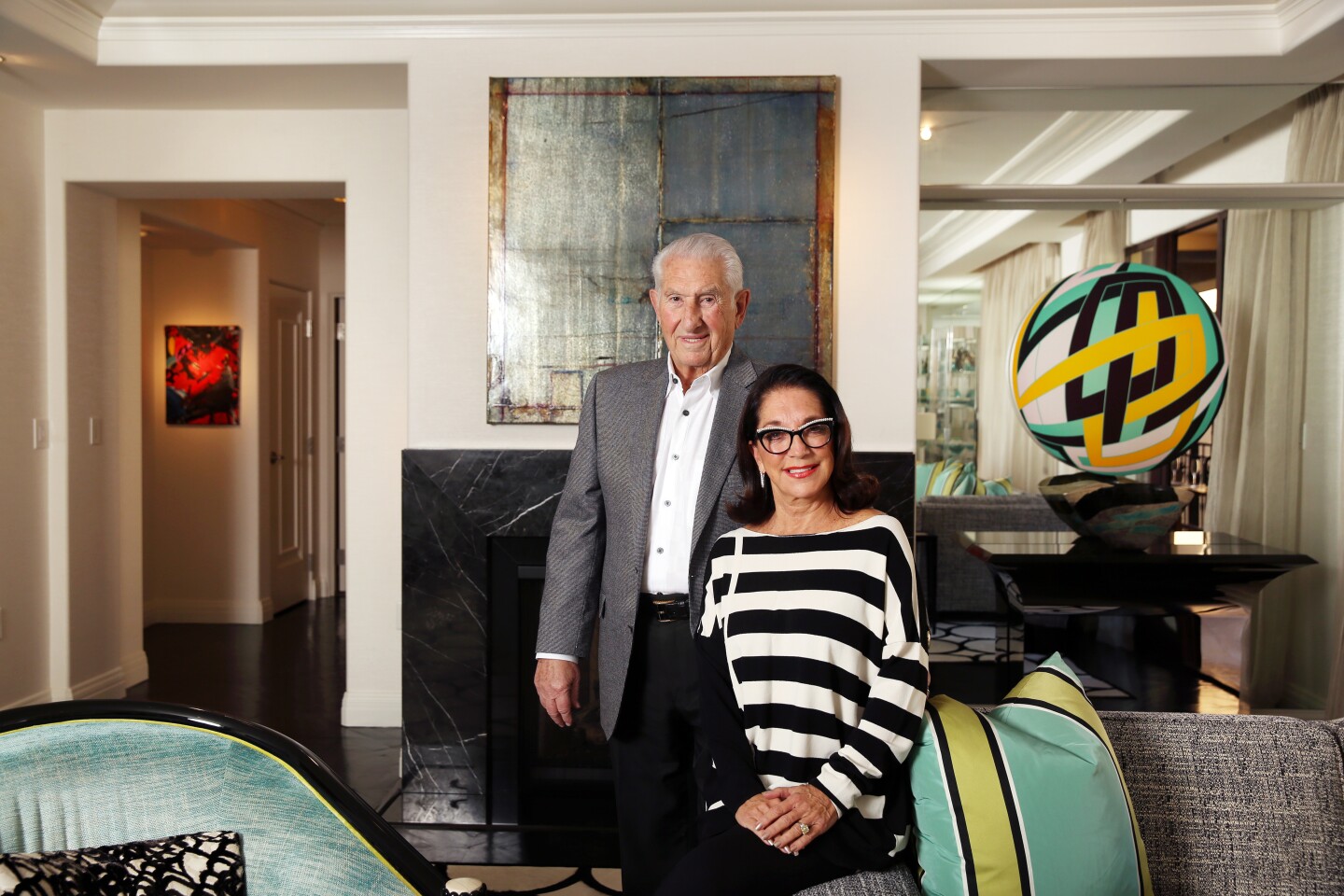 LOS ANGELES, CA-OCTOBER 15, 2019: Mort and Bobbi Topfer, left and right, pose for a portrait in their sixth floor apartment at the Montage Beverly Hills on October 9, 2019 in Los Angeles, California. The residence is the city's only five-star hotel residential property. (Photo By Dania Maxwell / Los Angeles Times)