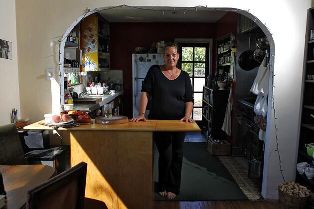 Corina Weibel bought her house in the Silver Lake neighborhood of L.A. seven years ago. She ripped out ratty cupboard doors, including lower ones destroyed by a previous owner's pit bull. Drywall came down, revealing an insect infestation. "It's the irony of my life," she jokes — a restaurant chef with a make-do home kitchen. But Weibel proves that a real cook can infuse a humble space with function and soul.