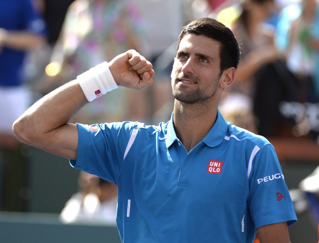 MAN44. Indian Wells (United States), 20/03/2016.- Novak Djokovic from Serbia celebrates after defeating Milos Raonic from Canada during their final match at the BNP Paribas Open tennis tournament in Indian Wells, California, USA, 20 March 2016. Djokovic won 6-2, 6-0. (Tenis, Estados Unidos) EFE/EPA/MIKE NELSON ** Usable by HOY, FL-ELSENT and SD Only **