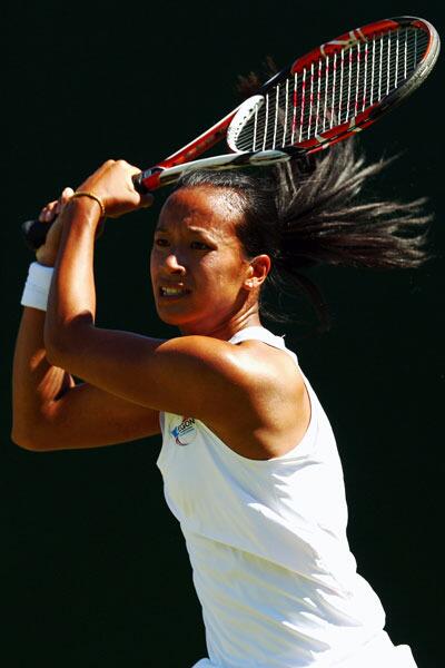 Anne Keothavong of Great Britain plays a backhand
