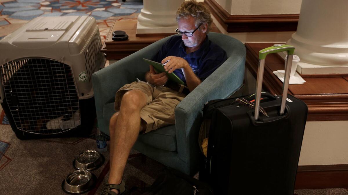 Ken Wild, an archaeologist with the National Park Service, evacuated from St. John during Hurricane Irma and is staying at the Sheraton in San Juan. (Carolyn Cole / Los Angeles Times)