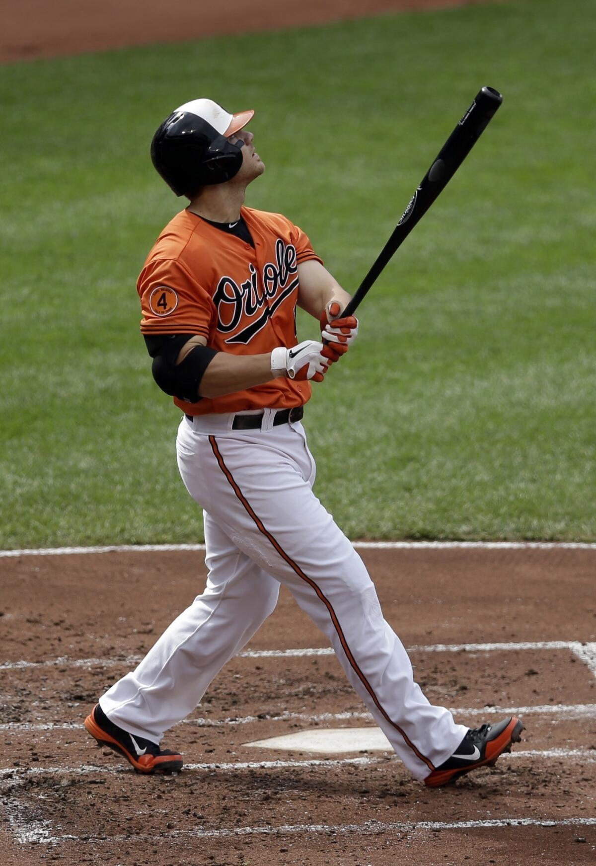 Baltimore's Chris Davis hits a solo home run during the Orioles' contest against the Toronto Blue Jays on Saturday.