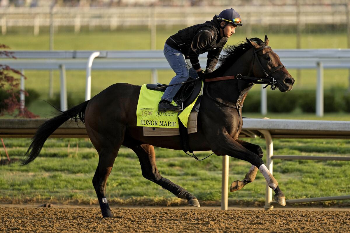 Kentucky Derby entrant Honor Marie works out at Churchill Downs