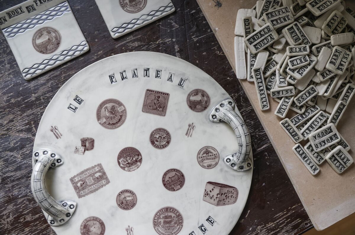 A cheese plate by Bounaud shows artwork derived from a laser printer.