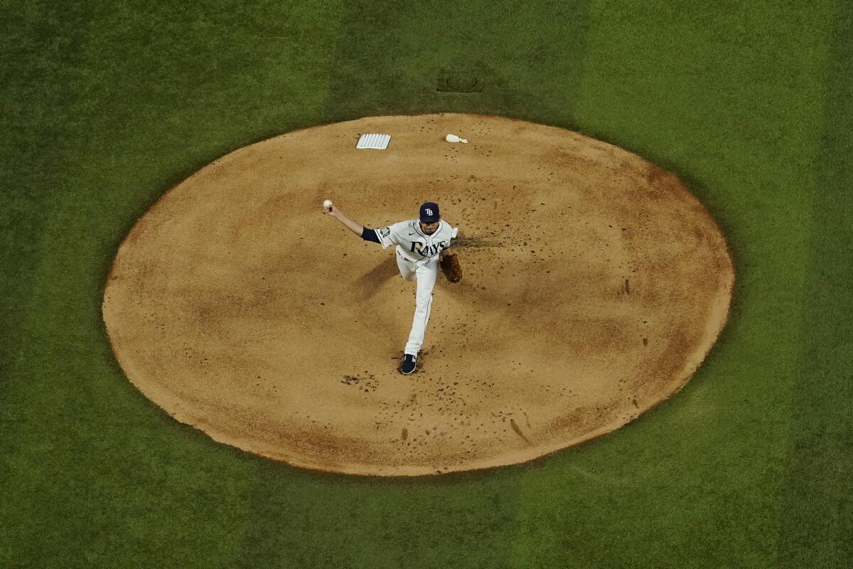 Tampa Bay Rays starting pitcher Charlie Morton throws during the first inning.