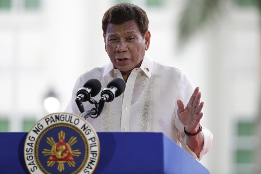 FILE - Philippine President Rodrigo Duterte speaks during the 123rd anniversary of the proclamation of the Philippine independence rites on June 12, 2021, at the Provincial Capitol of Bulacan province, Philippines. Duterte on Tuesday, Dec. 14, 2021, withdrew his senatorial candidacy in next year’s elections in his latest change of plans for after his turbulent term in power ends, when critics say he would likely face an array of lawsuits for an anti-drugs crackdown that has left thousands of mostly petty suspects killed. (AP Photo/Aaron Favila, File)