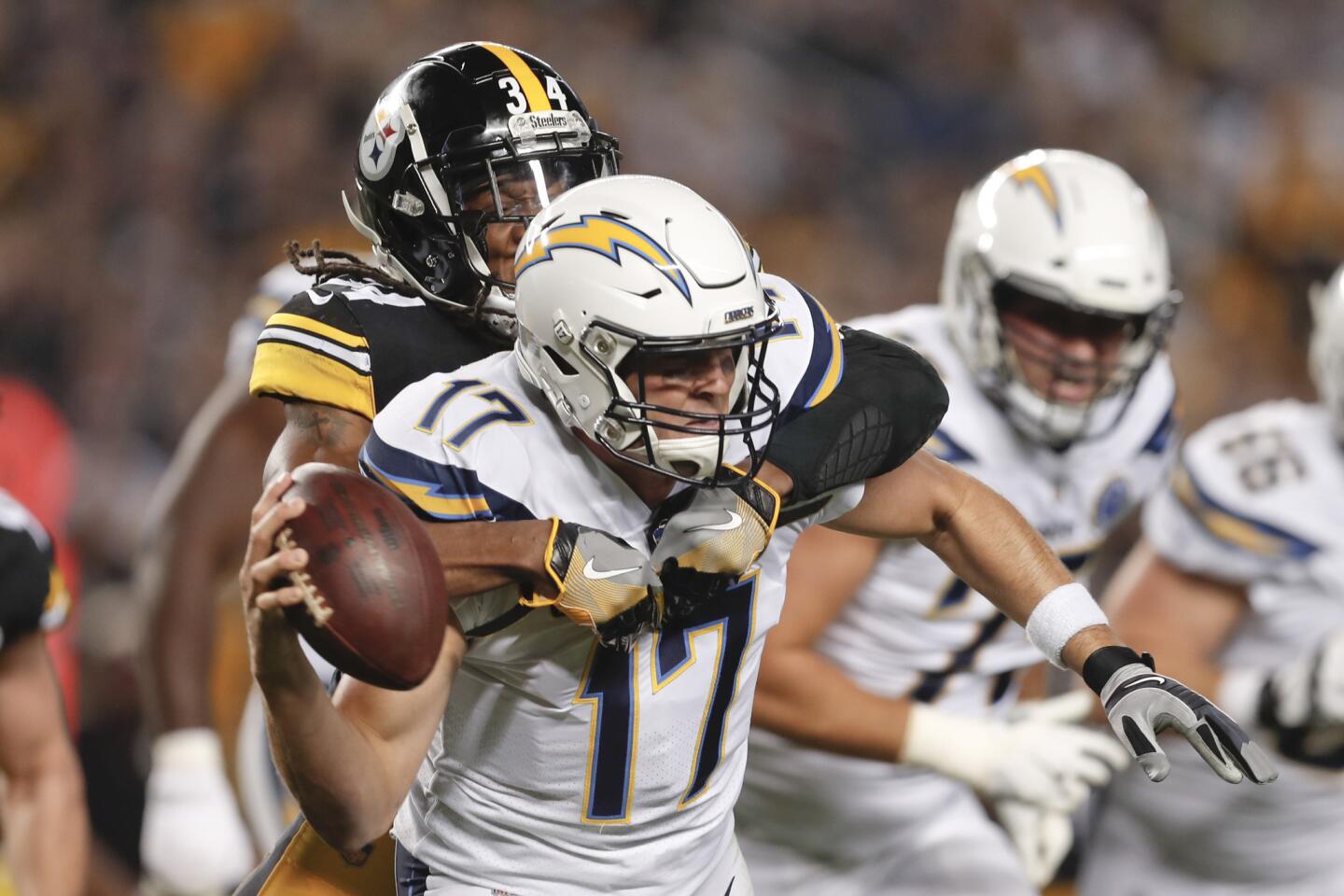 Pittsburgh Steelers strong safety Terrell Edmunds (34), left, sacks Los Angeles Chargers quarterback Philip Rivers (17) in the first half of an NFL football game, Sunday, Dec. 2, 2018, in Pittsburgh.