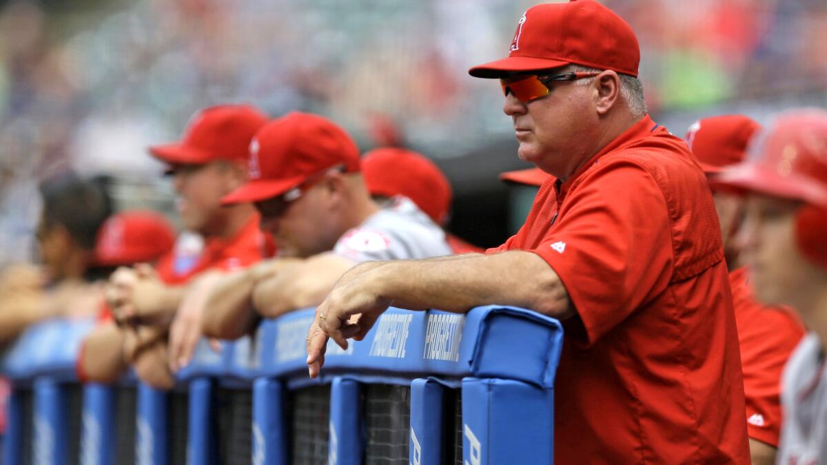 Manager Mike Scioscia will try to guide the Angels through a tough stretch run one game at at time. "Every game you have a chance to gain ground," he says.