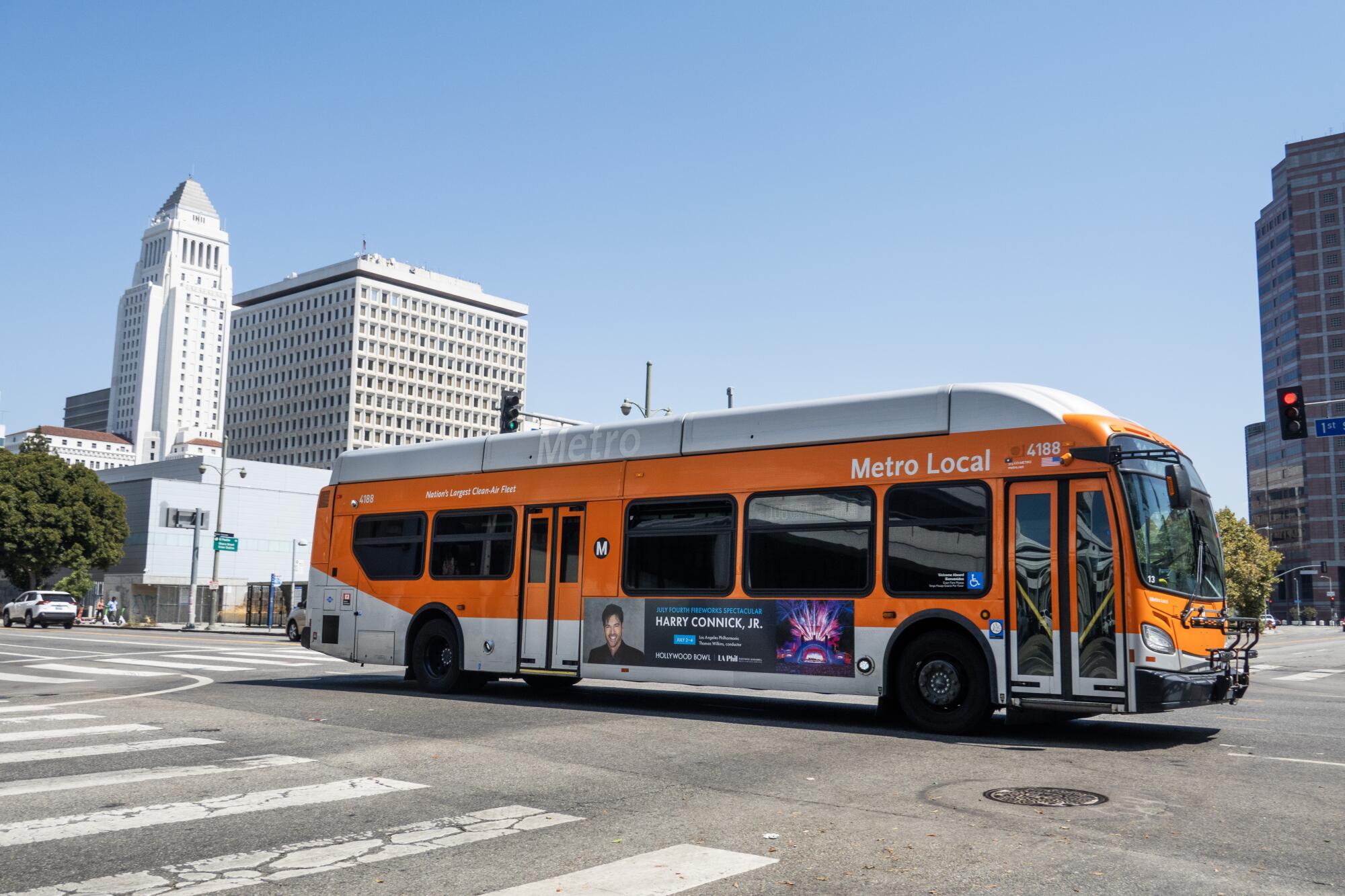  A Metro bus runs on 1st Street in Los Angeles on Tuesday, July 23, 2024.