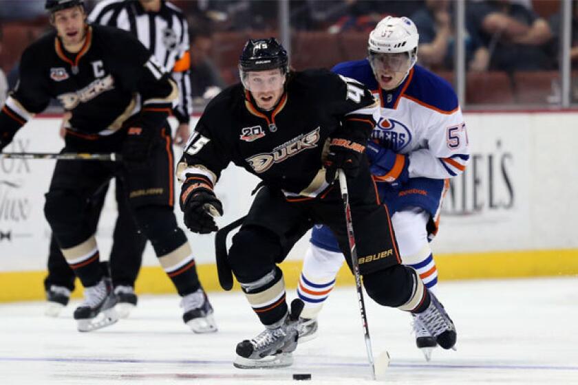 The Ducks' Sami Vatanen is pursued by Edmonton's David Perron back in December.