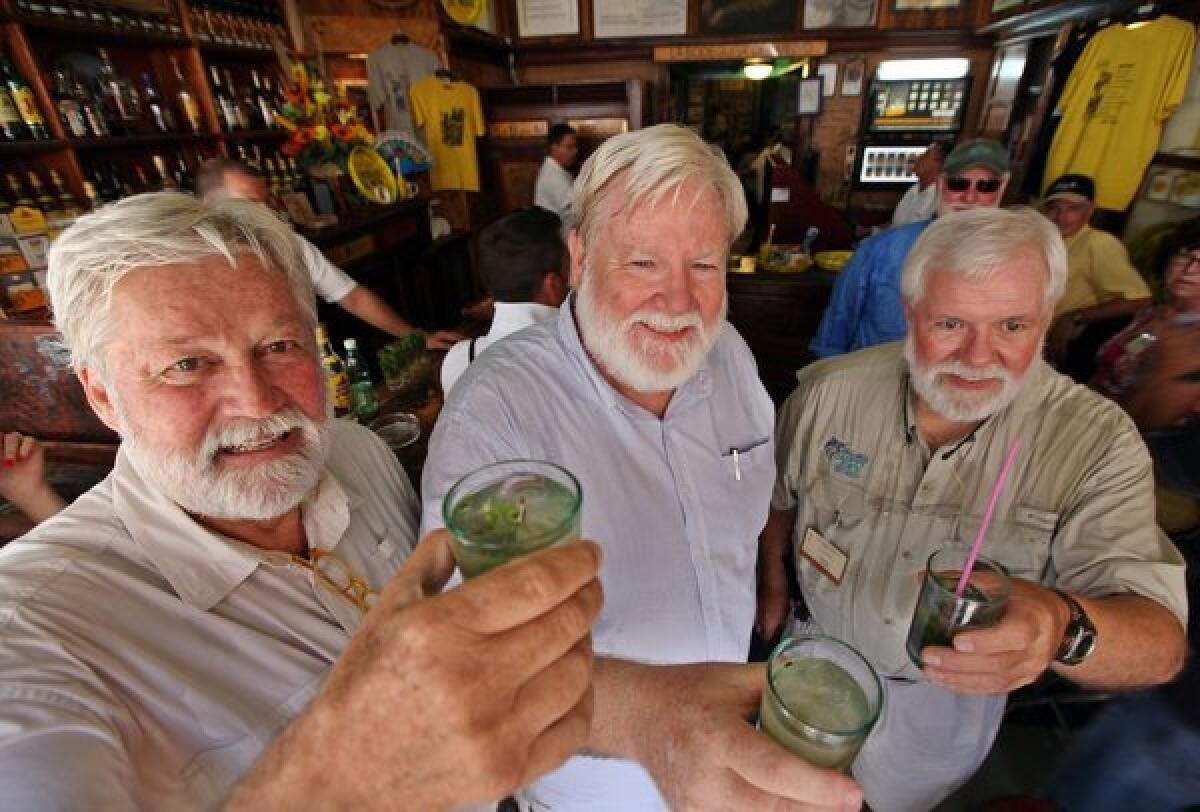 Three past winners of the Key West Papa Hemingway look-alike contest attend a conference in Havana in June.