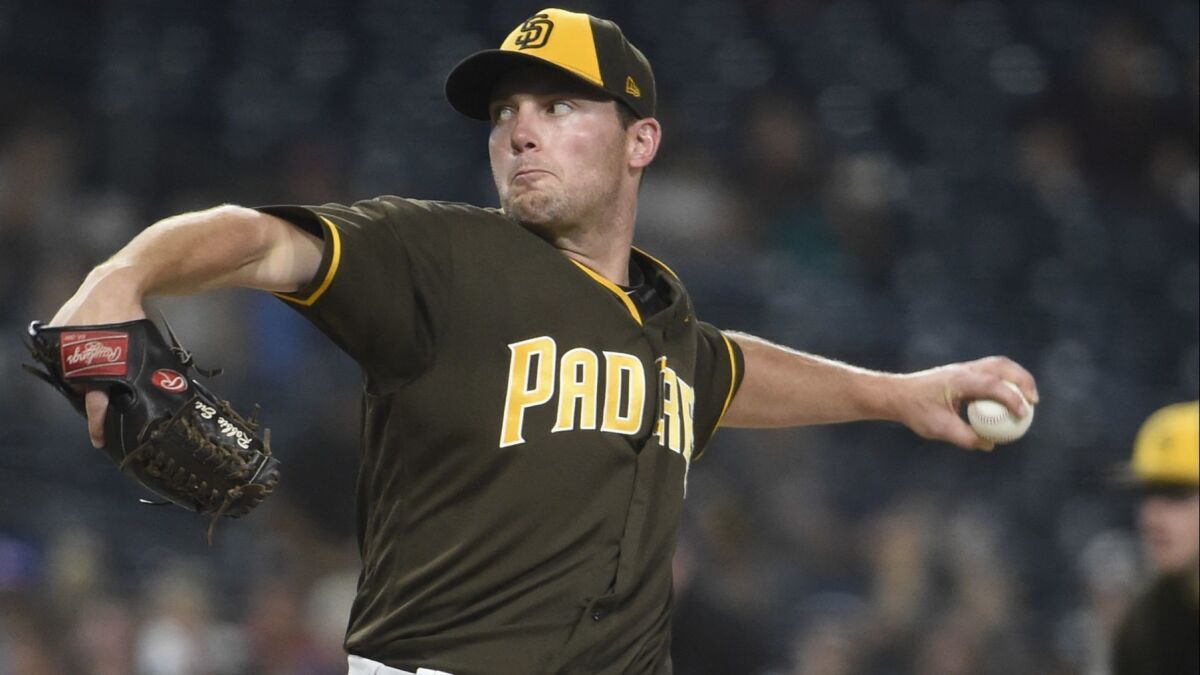 The Padres' Robbie Erlin pitches during the second inning of a baseball game against the Texas Rangers at PETCO Park on September 14, 2018 in San Diego, California.