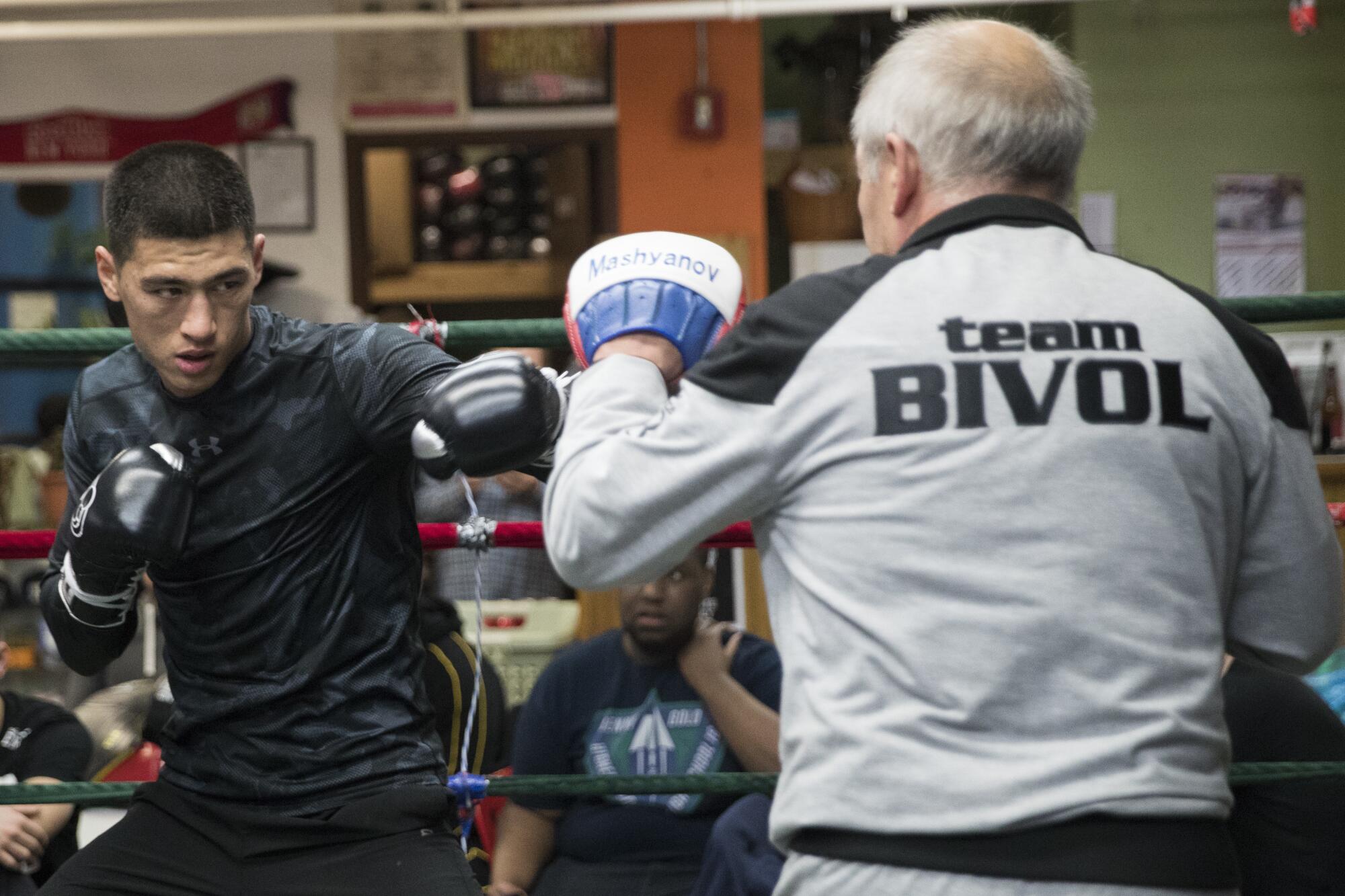 Dmitry Bivol spars with his trainer 