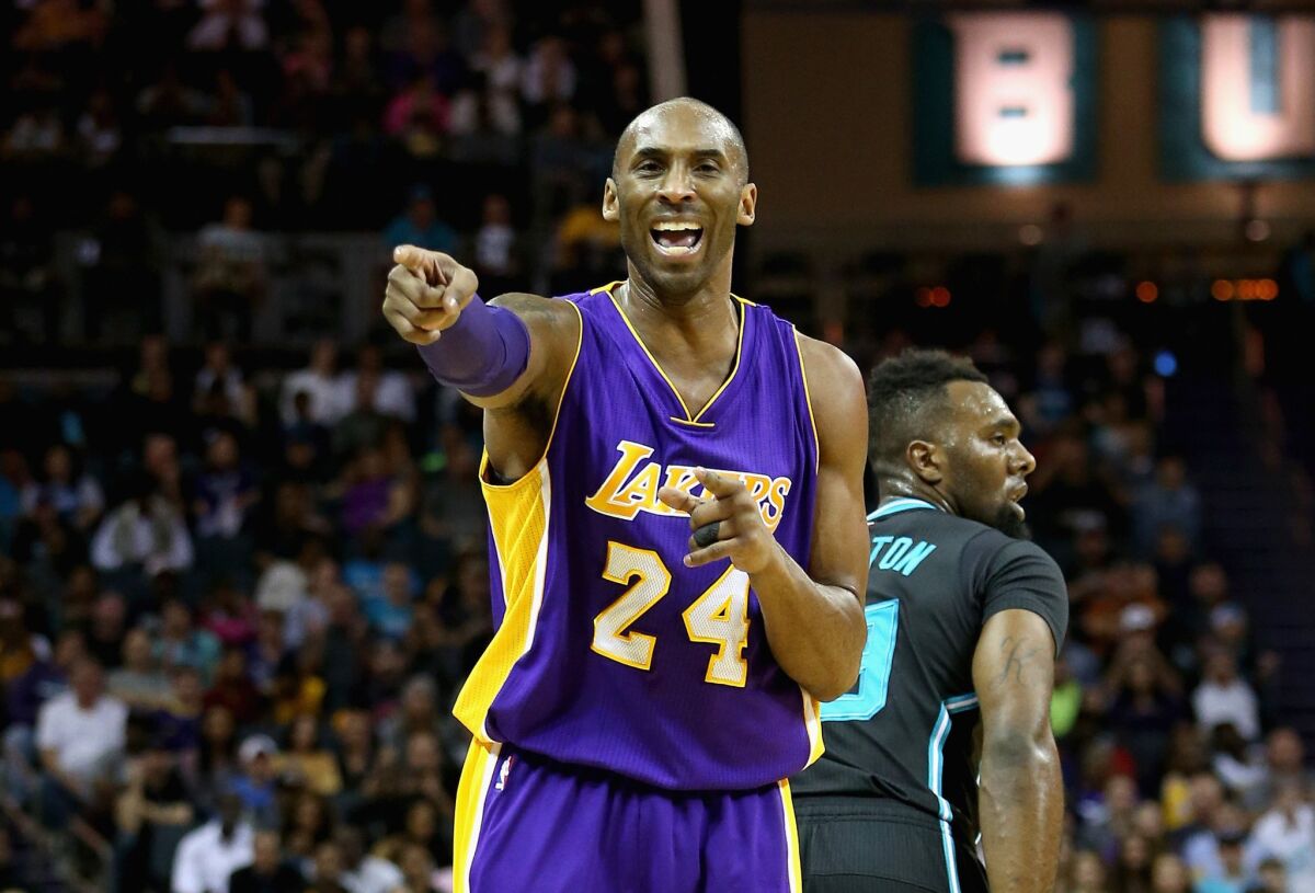 Kobe Bryant points and yells after a play against the Hornets in Charlotte, N.C., on Dec. 28.