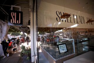 SANTA MONICA, CA - JANUARY 9, 2024 - Pedestrians walk past a shuttered Sweet Lady Jane bakery along Montana Avenue in Santa Monica on January 9, 2024. The beloved bakery, unexpectedly closed its six locations on New Year's Day, citing a lack of a sales. However, the company has been embroiled in a class action lawsuit for the past year over wage abuse allegations. The move blindsided workers and customers, who were all under the impression the business was doing well. (Genaro Molina/Los Angeles Times)