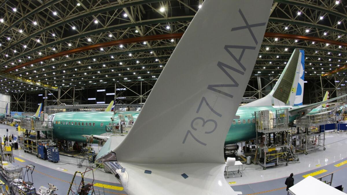 The distinctive winglet on the second Boeing 737 MAX airplane is shown through a fisheye lens. The plane was built in December 2015 on an assembly line in Renton, Wash.