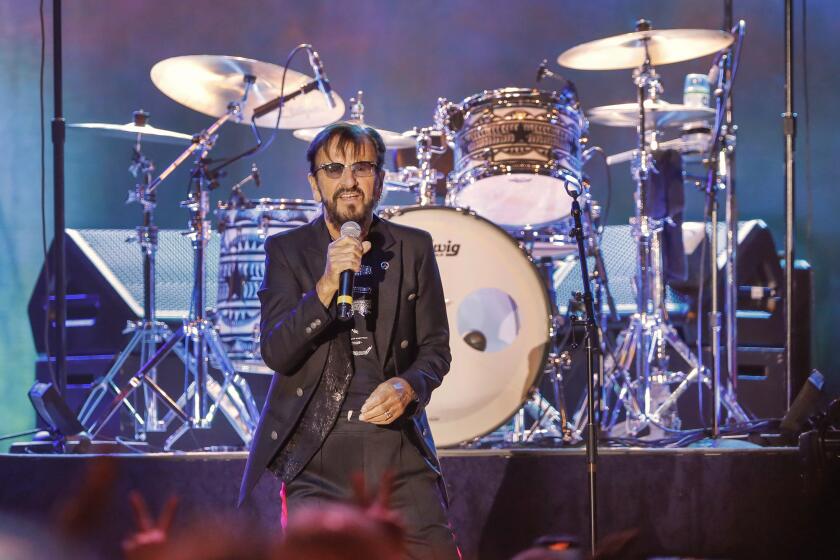 Temecula, CA - May 19: Ringo Starr stands in front of his drum set as he performs with his All-Starr Band 2023 at Pechanga Resort Casino. (Charlie Neuman / For The San Diego Union-Tribune)
