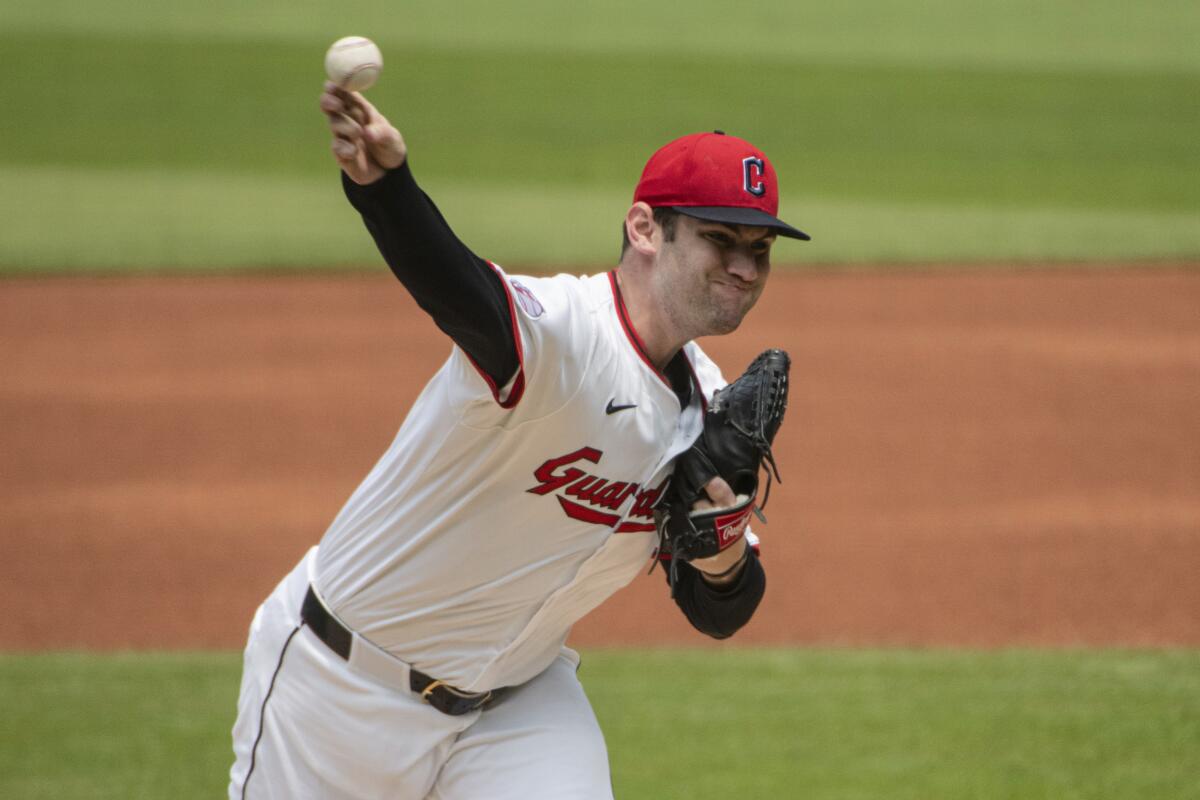 Cleveland Guardians starting pitcher Gavin Williams delivers.