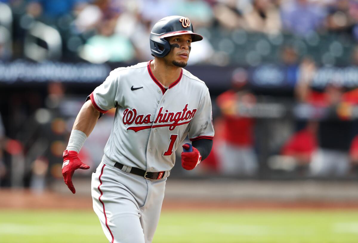 Washington Nationals' Cesar Hernandez rounds the bases after hitting a home run against the New York Mets during the fifth inning of a baseball game Sunday, Sept. 4, 2022, in New York. (AP Photo/Noah K. Murray)