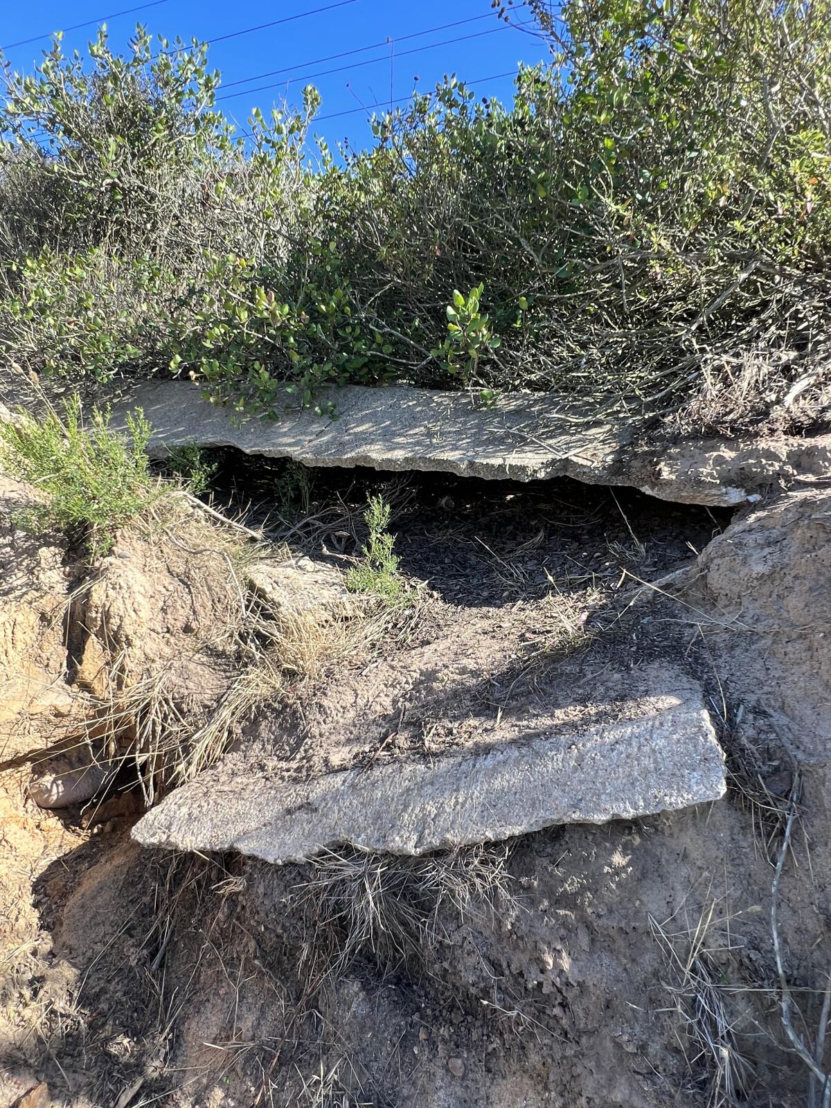 A broken concrete ditch on Mount Soledad near La Jolla Scenic Drive South