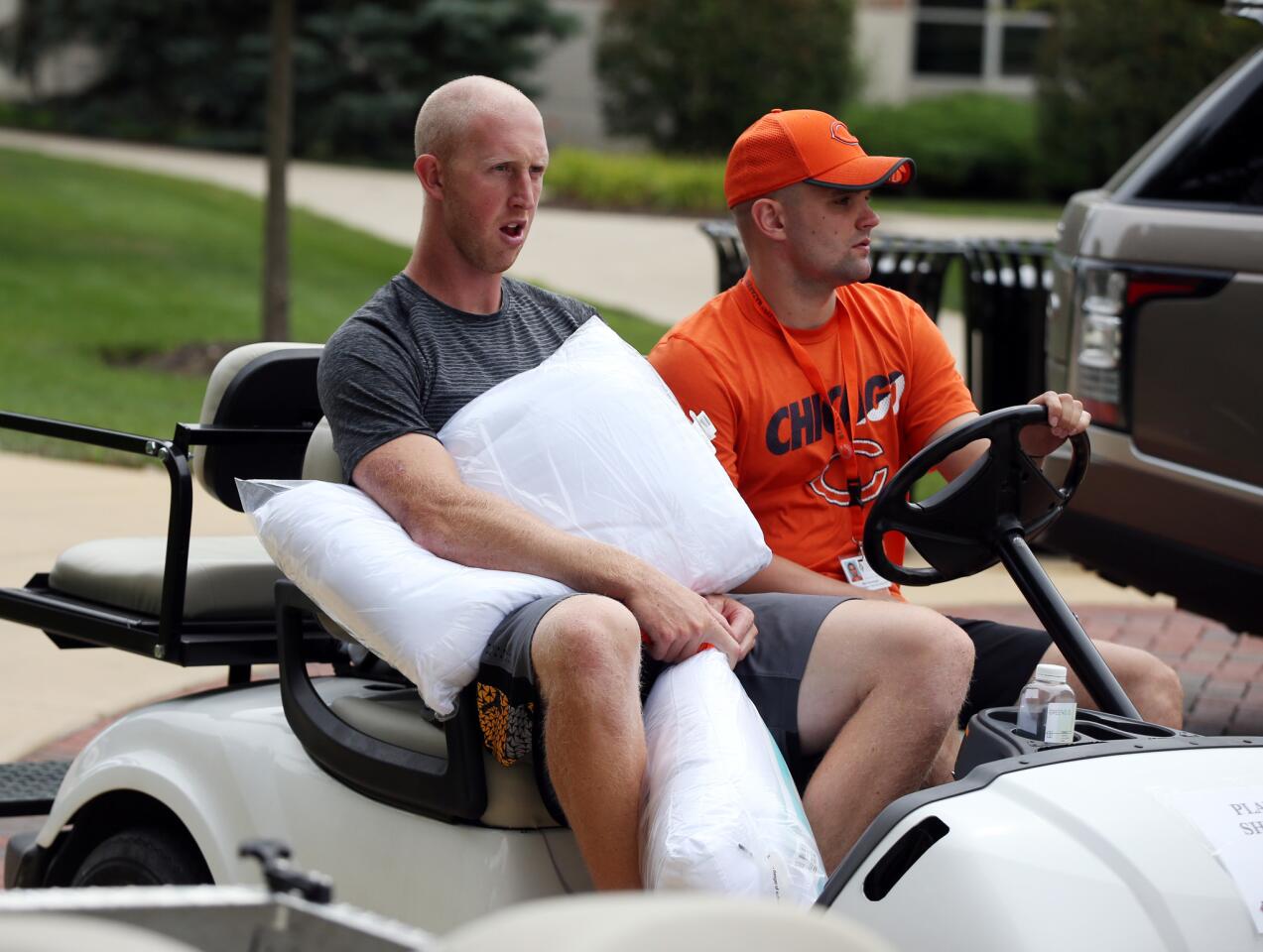 Quarterback Mike Glennon arrives (with pillow) as the Bears report to training camp in Bourbonnais on July 26, 2017.