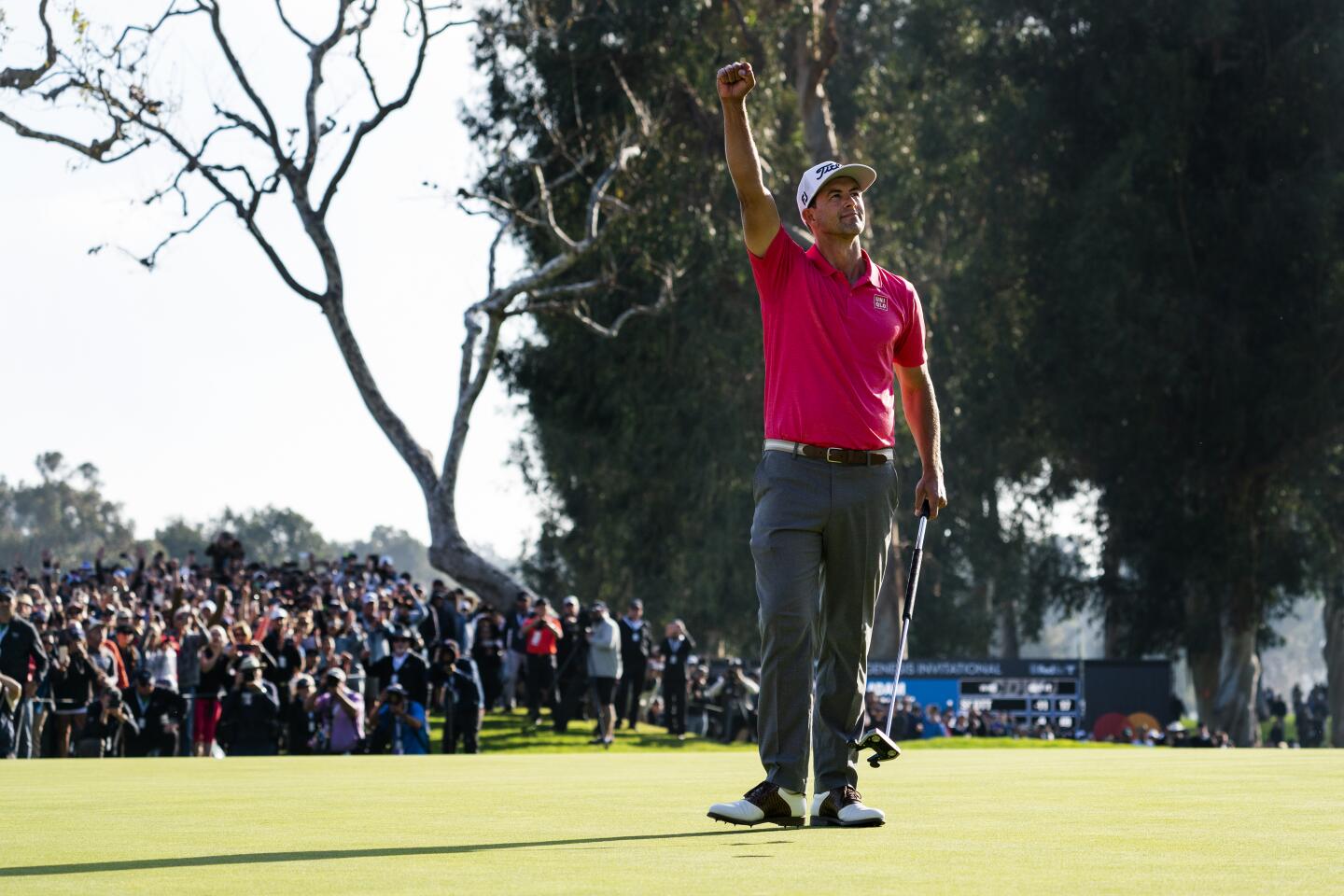 Adam Scott celebrates after winning the Genesis Invitational at Riviera Country Club in Pacific Palisades on Feb. 16, 2020.