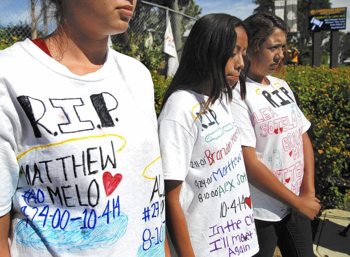 Students from Capistrano Valley High School in Mission Viejo wear T-shirts honoring classmates Alex Sotelo and Matthew Melo, as well as 8th-grader Brandon Moreno. The boys and two girls from Laguna Hills High School were killed in a car crash in Irvine over the weekend.