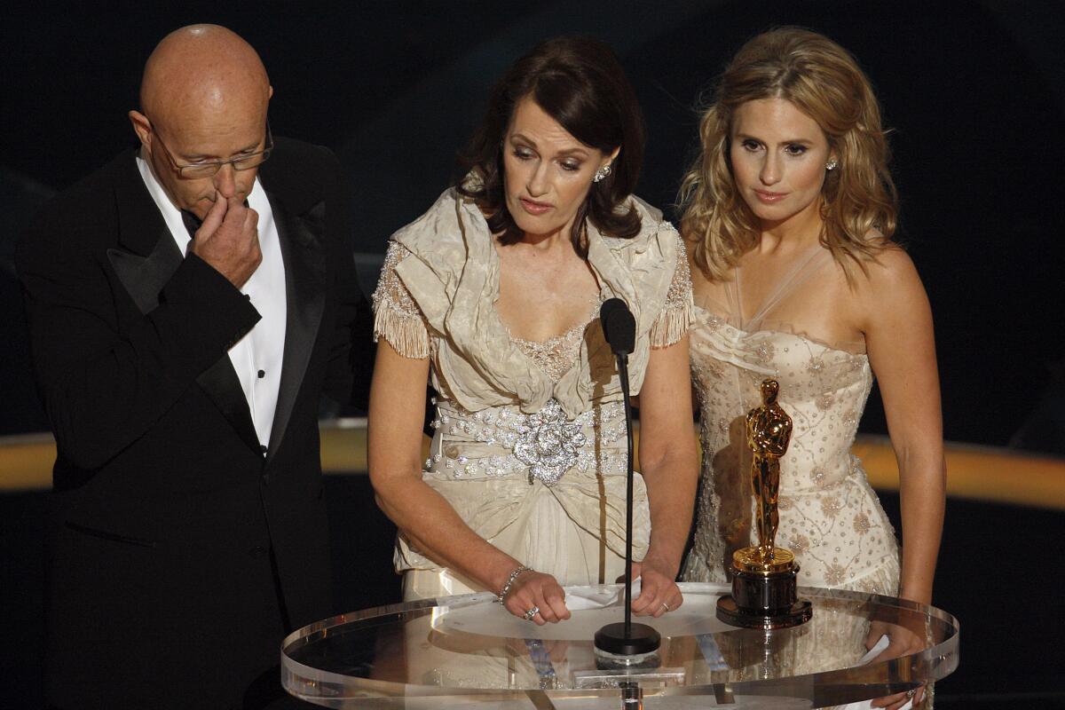 Accepting the supporting actor Oscar given posthumously to Heath Ledger, from right, Ledger's sister Kate, mother Sally Bell and father Kim at the 81st Annual Academy Awards on February 22, 2009. (Mark Boster / Los Angeles Times)