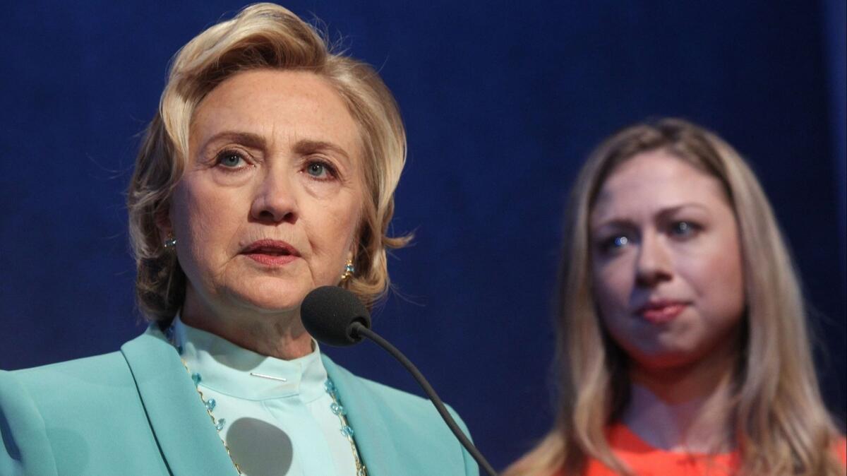 Former Secretary of State and presidential candidate Hillary Clinton and daughter Chelsea attend the Clinton Global Initiative in 2013 in New York.