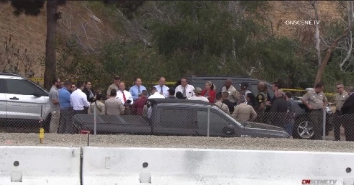 San Diego sheriff's deputies and homicide investigators