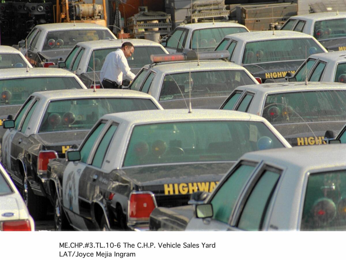 The CHP vehicle sales yard in 1996. The sedans made today are too small for the CHP.