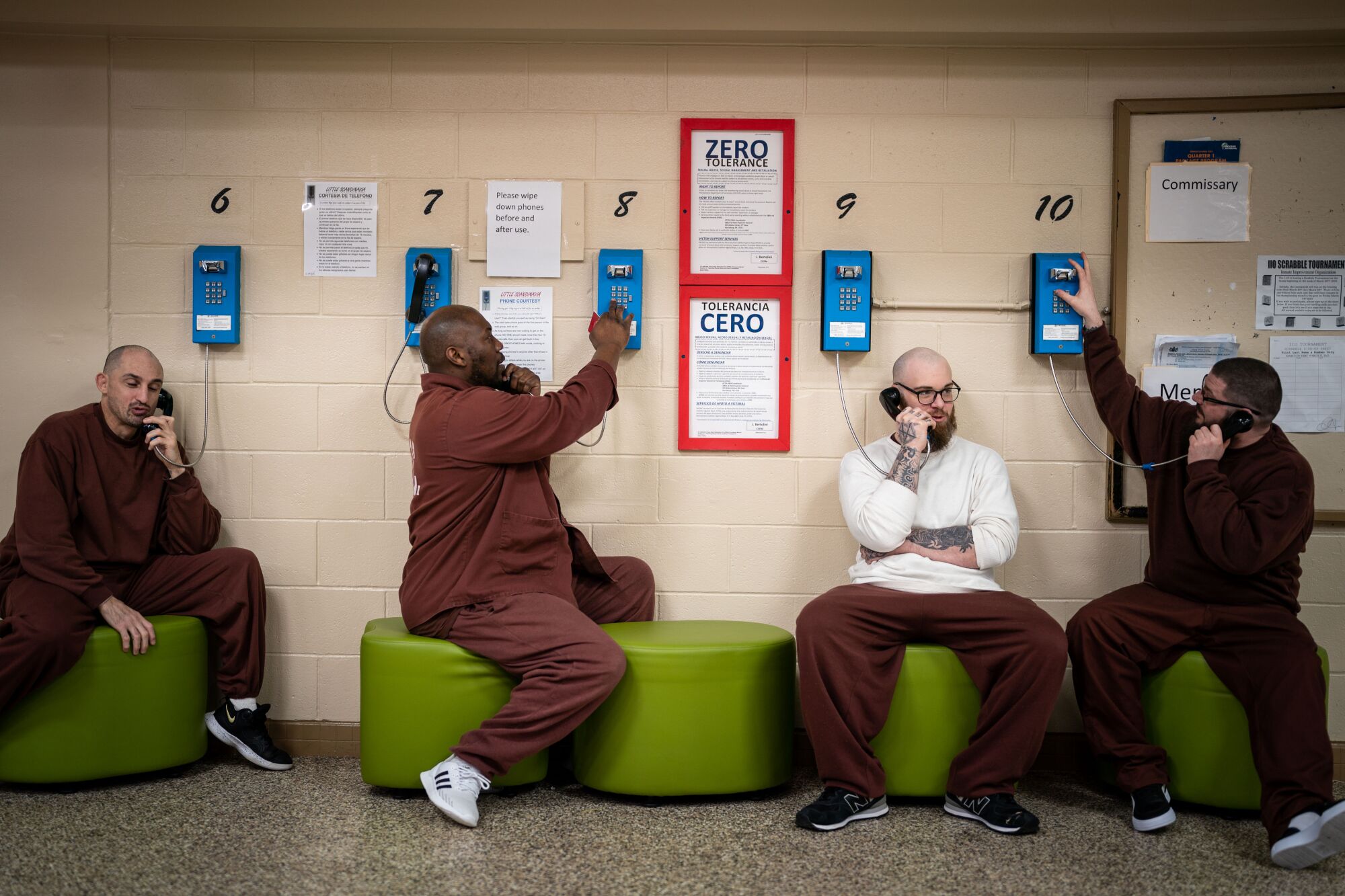 Inmates in the "Little Scandinavia" unit make phone calls in a relaxed setting.