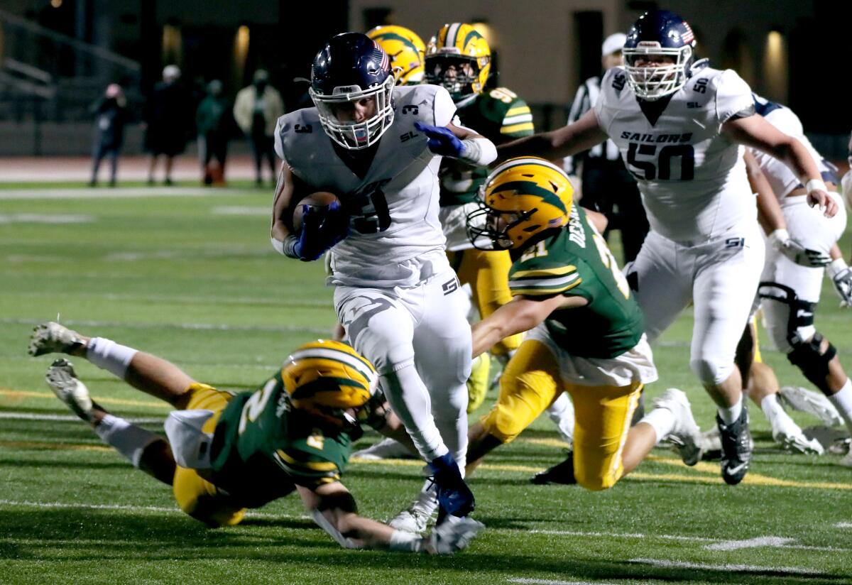 Newport Harbor's Justin McCoy scores a touchdown vs. Edison.