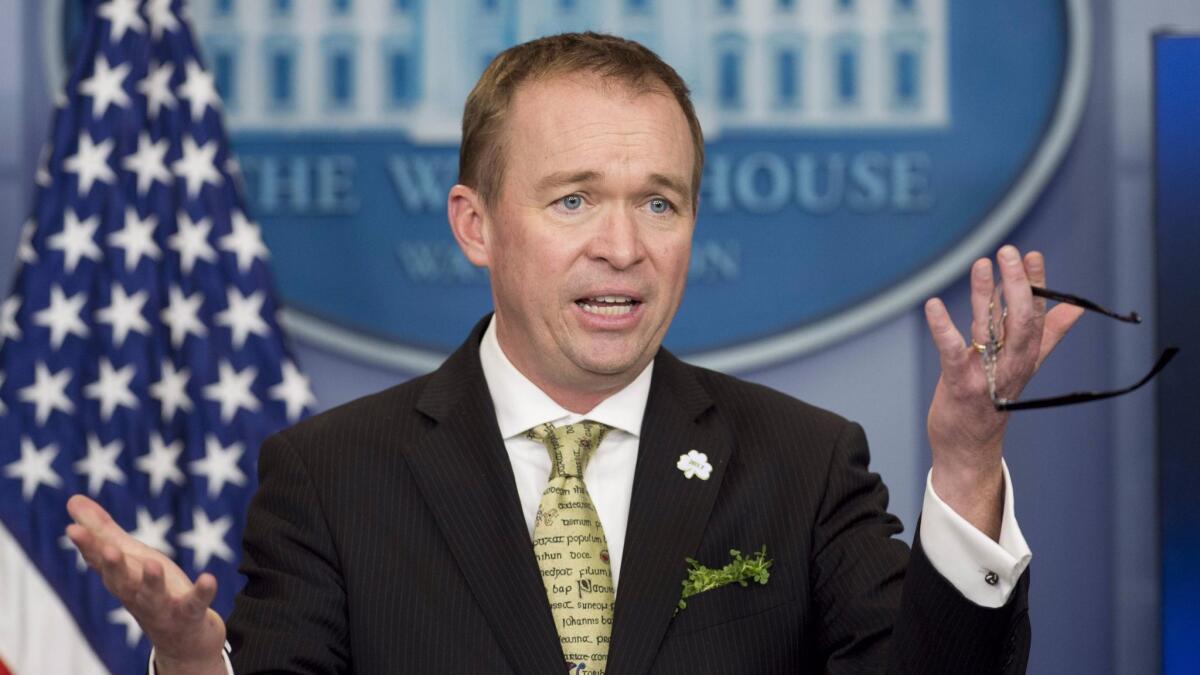 Office of Management and Budget director Mick Mulvaney discusses President Trump's budget during a March briefing.