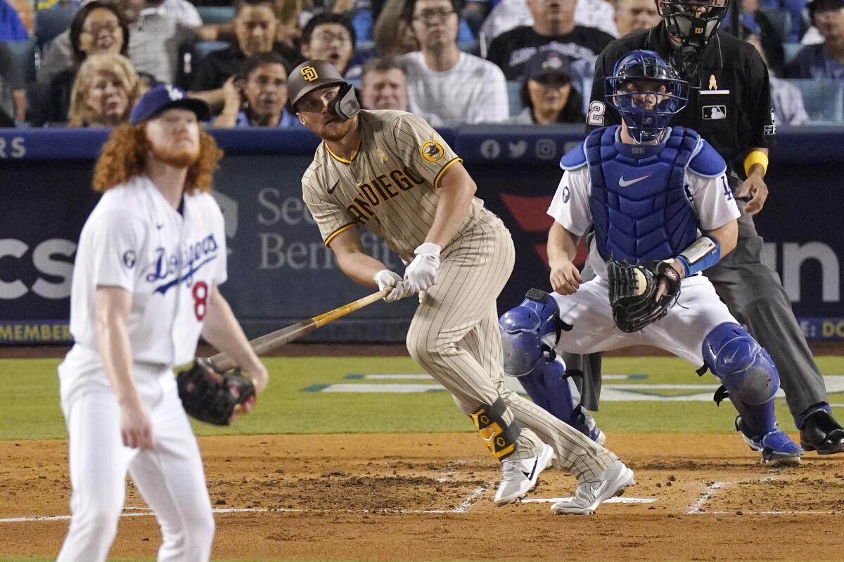 San Diego's Brandon Drury hits a two-run home run off Dodgers pitcher Dustin May in the third inning Friday.
