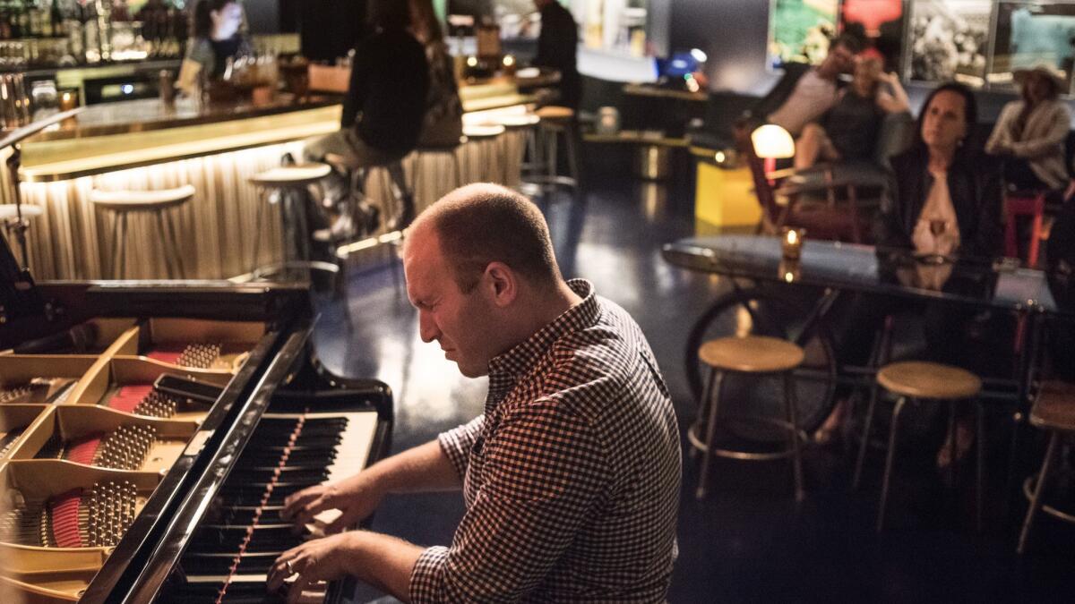 Max Haymar performs with his jazz trio at Sam First Bar.