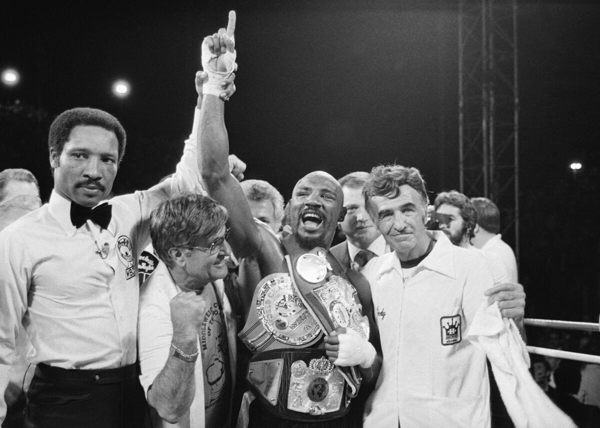 In this April 1985 file photo, middleweight champion Marvin Hagler celebrates his win over Thomas Hearns.