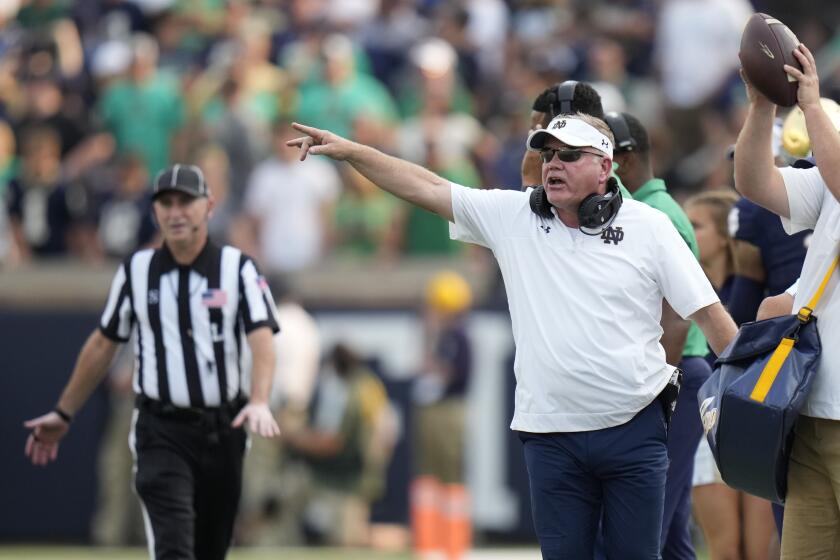 Notre Dame head coach Brian Kelly gestures from the sideline during the second half of an NCAA college football game against Toledo in South Bend, Ind., Saturday, Sept. 11, 2021. Notre Dame won 32-29. (AP Photo/AJ Mast)