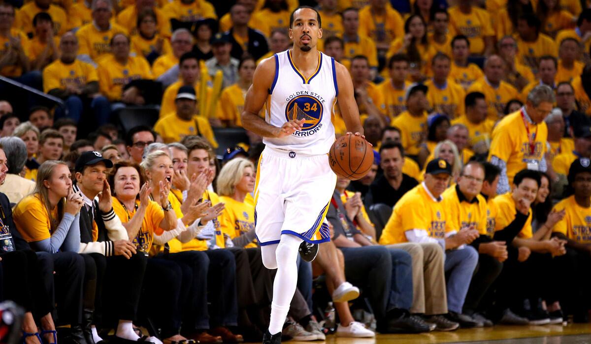 Golden State's Shaun Livingston dribbles up court in the second half against the Houston Rockets during Game 2 of the Western Conference Finals on Thursday.