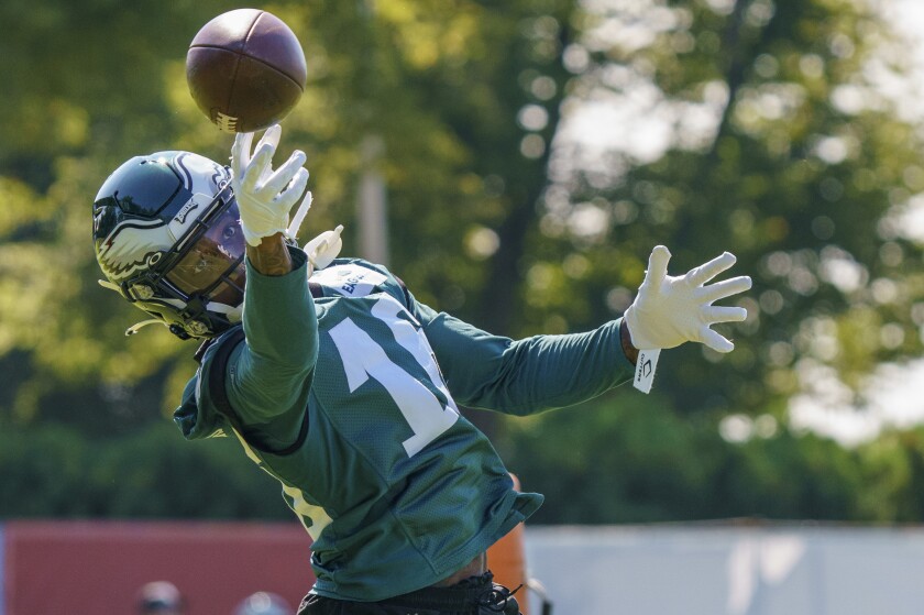 Philadelphia Eagles wide receiver Quez Watkins reaches for the ball during practice at NFL football training camp, Thursday, Aug. 5, 2021, in Philadelphia. (AP Photo/Chris Szagola)